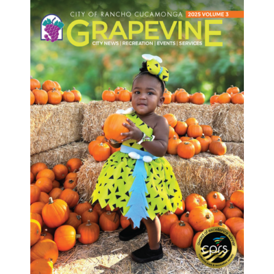 Grapevine 2025 Volume 3 cover with a little girl dressed up at Spooktacular 