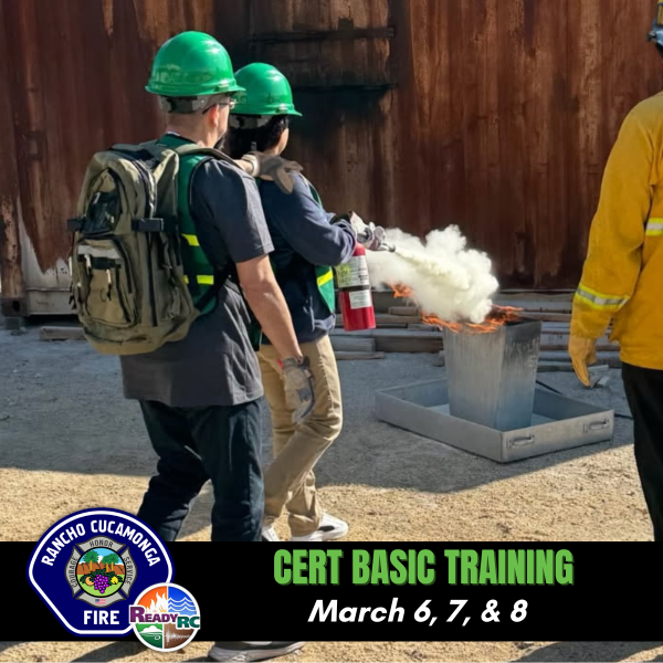CERT Students extinguishing a small trash can fire 