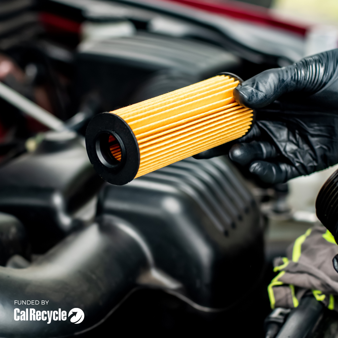 Photo of a new oil filter in front of the engine of a car with the words "funded by" and CalRecycle logo