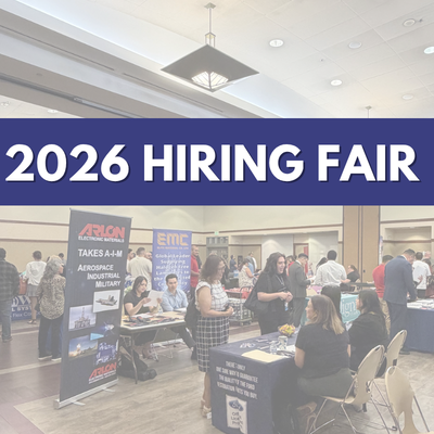 Banner promoting the 2026 Hiring Fair, featuring attendees meeting with employers at recruiting booths inside at Goldy S. Lewis Community Center