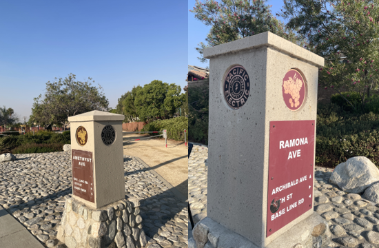 Reference photos of the concrete directional marker along the Pacific Electric Trail showing the shape, size, and existing signage where the Mini Mural Project will be installed.