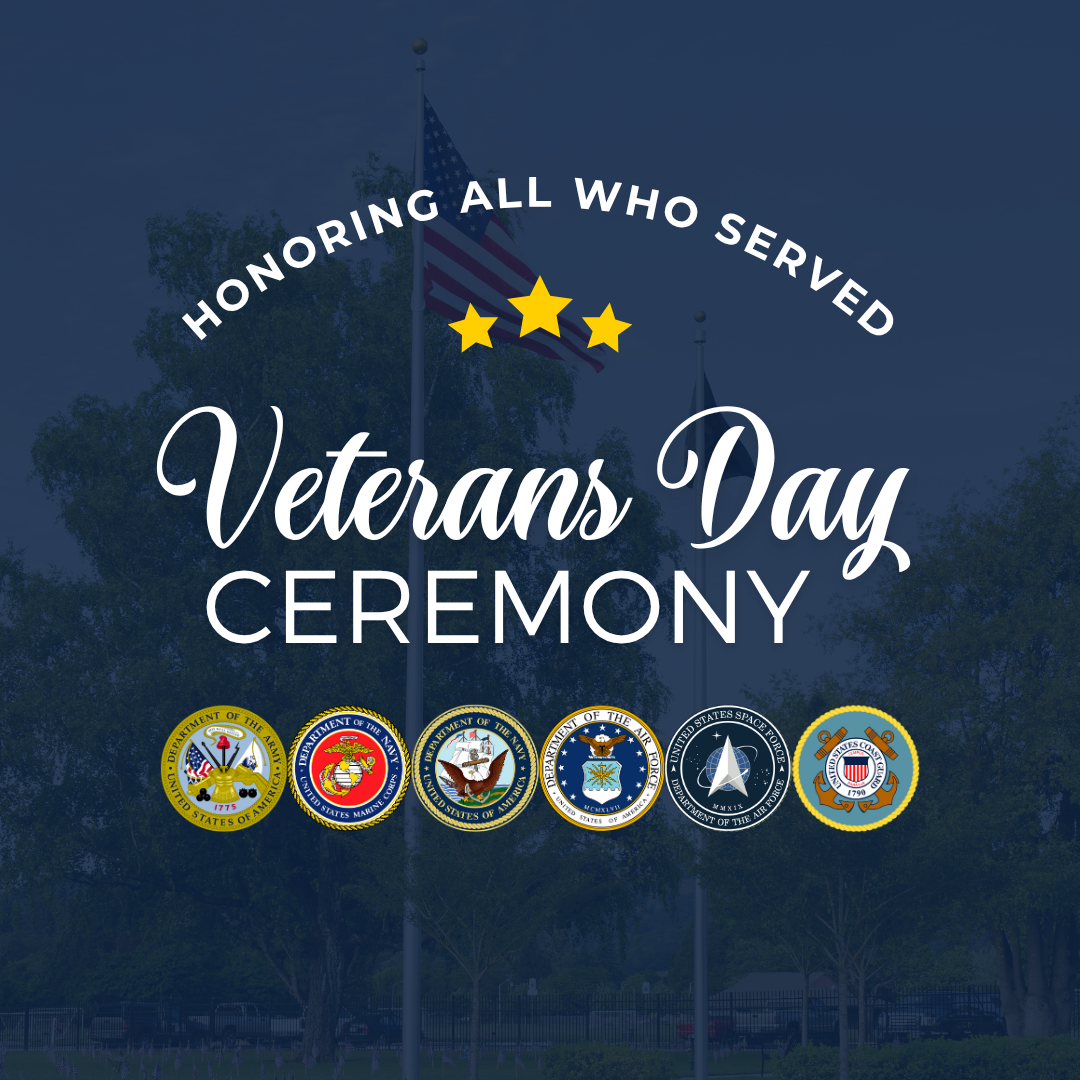 Graphic for a Veterans Day ceremony featuring the text “Honoring All Who Served” above three yellow stars, with “Veterans Day Ceremony” displayed prominently in the center. Below the text are seven official military service seals. The background shows a faint image of an outdoor scene with flagpoles and trees.