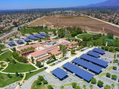 Aerial view of Central Park, Solar Panels covered parking structure, and neighborhood