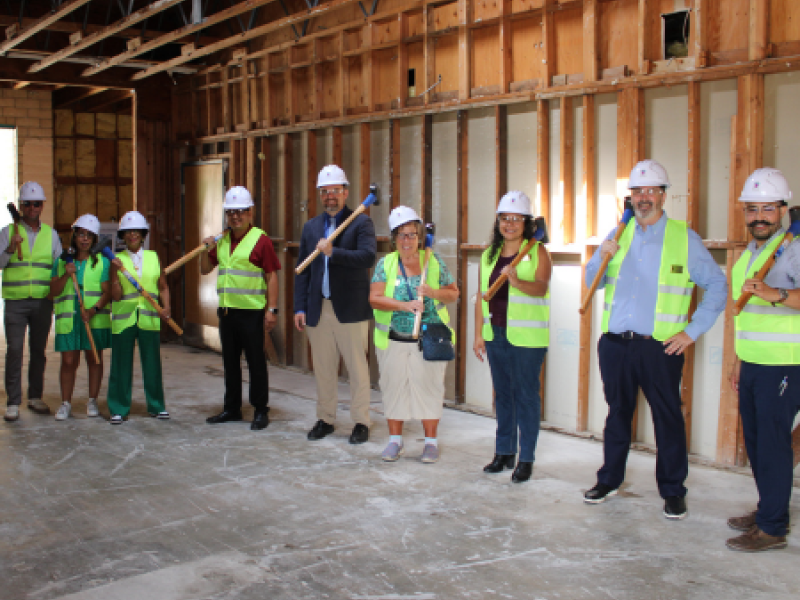 WSLEP Staff, Board and Council posed inside demo building
