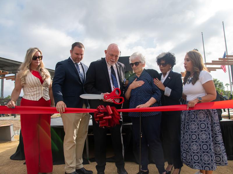City Council cutting ceremonial ribbon signifying the opening of the park