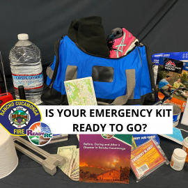 Image of duffel bag packed with essential items for an emergency kit
