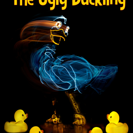 The Ugly Duckling performance on stage with neon lights