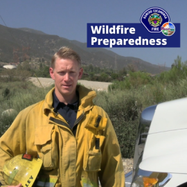Firefighter giving wildfire preparedness videos